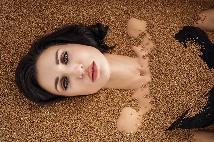 Brunette girl in buckwheat