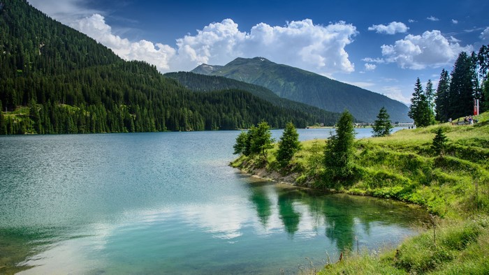 4K Lake Davos Switzerland Mountains Trees Clouds