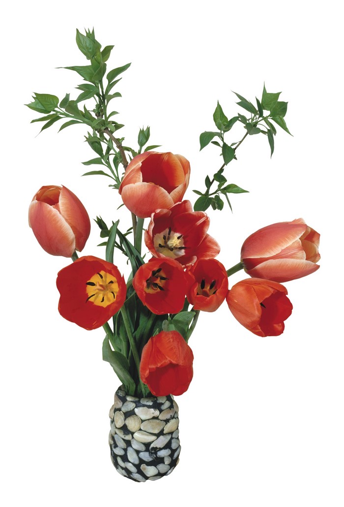 Red tulips in a stone vase