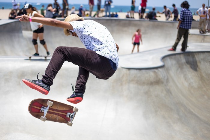 Skateboarder jumping in a skatepark