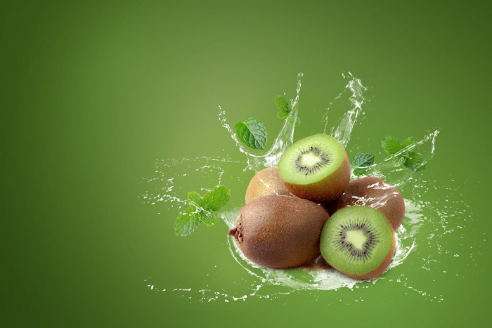 Kiwi fruit with mint and water splash