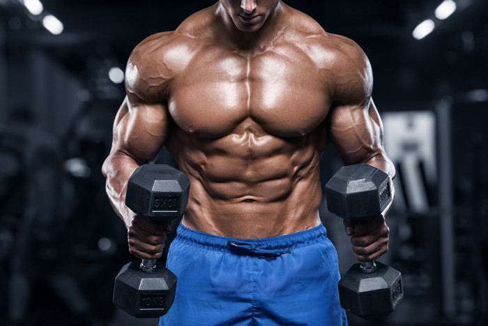 Bodybuilder with dumbbells