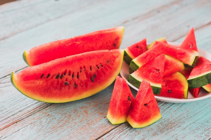 Watermelon Slices on a Wooden Table