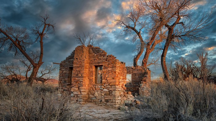 Ruins of a stone building with Cottonwood Trees in Hanksville, Utah