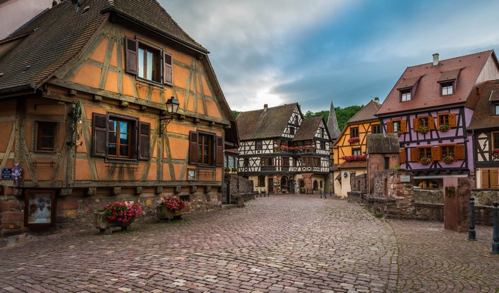 Half-timbered houses on a cobblestone street in Kaysersberg, France