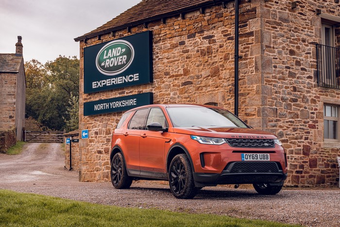 Orange Land Rover Discovery Sport D180 SE at Experience North Yorkshire
