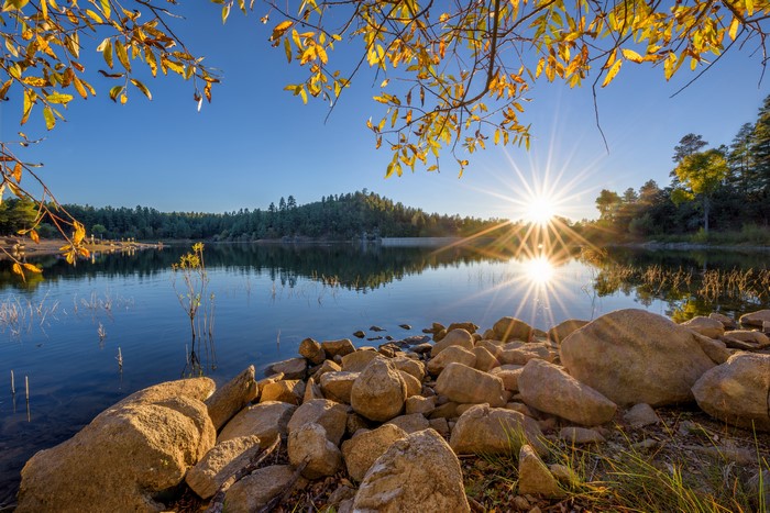 Sunrise over Goldwater Lake with Autumn Leaves