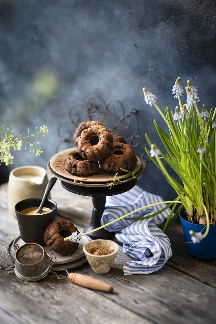 Chocolate bundt cakes with coffee and flowers