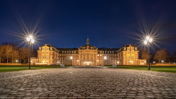 Muenster Palace at Night with Street Lights