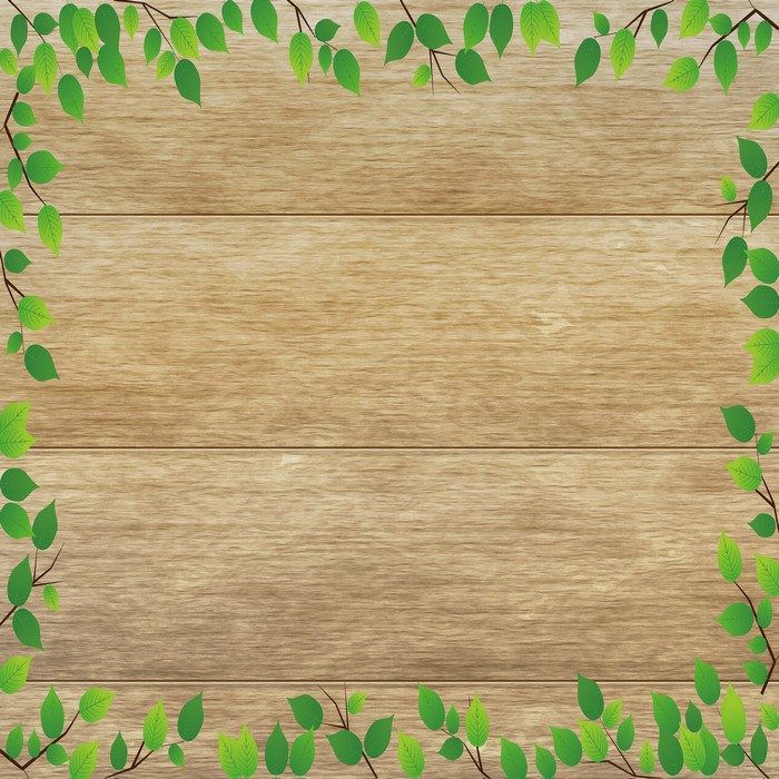 Wood planks with green branches and leaves border