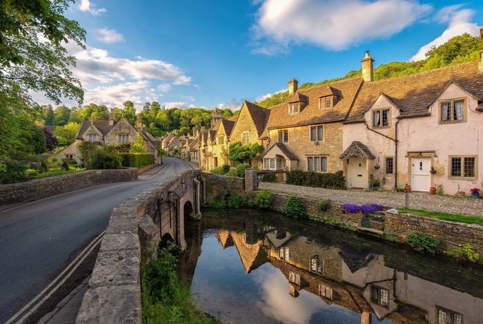 Castle Combe Village with River and Bridge, Cotswolds, England