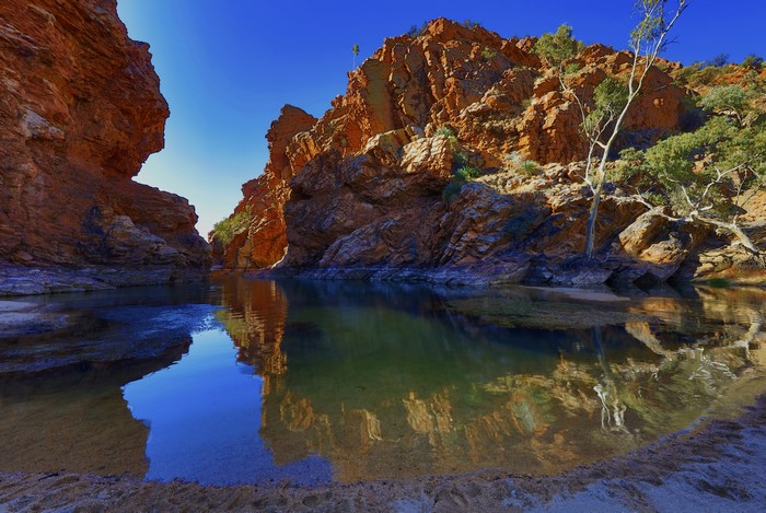 Canyon with water and red rocks in Northern Territory, Australia
