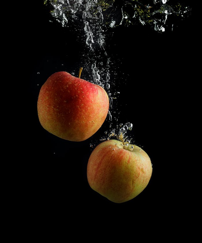 Two Apples Falling in Water