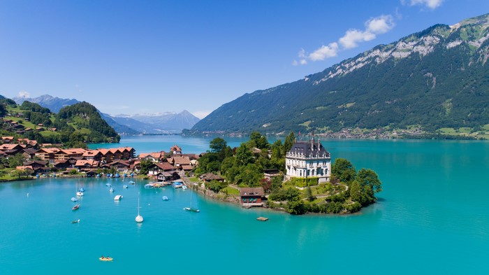Lake Brienz with village and mountains, Switzerland