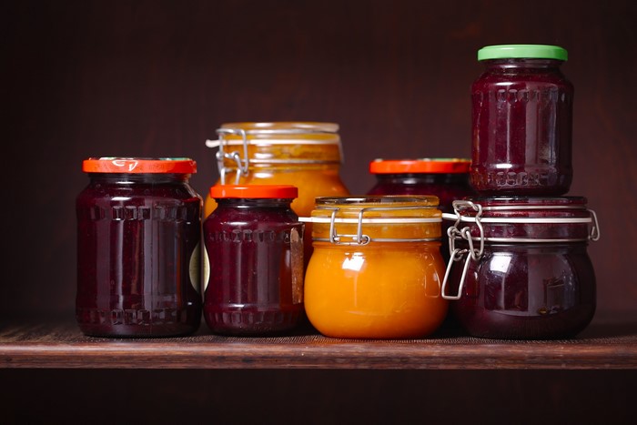 Jars of jam on a shelf