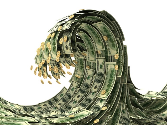Wave of US Dollar Bills and Gold Coins