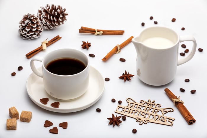 Christmas coffee with cinnamon and milk