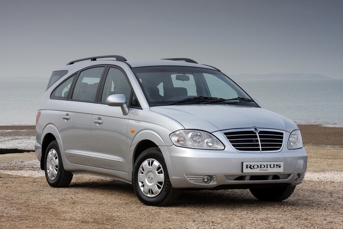 Silver SsangYong Rodius Minivan on a Beach