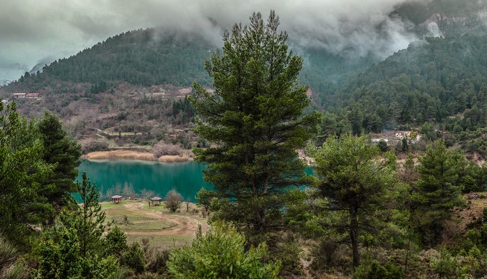Tsivlou Lake in Greece with Foggy Mountains and Forests