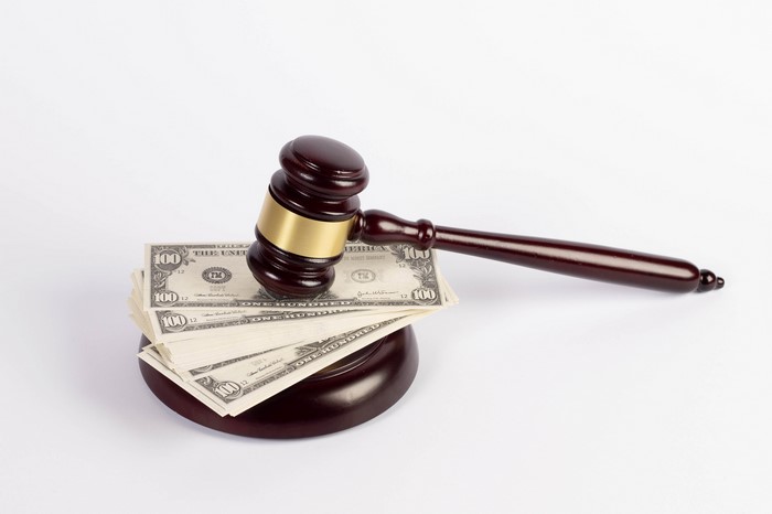 Gavel on Stack of US Dollar Bills