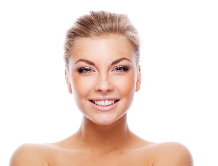 Blonde model with makeup smiling