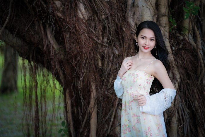 4K Portrait of Asian Brunette Girl in Dress