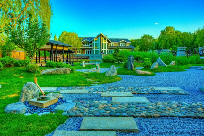 Zen garden with a modern house and gazebo