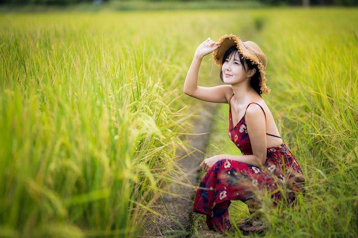 4K Serene Asian Woman Sitting in Field