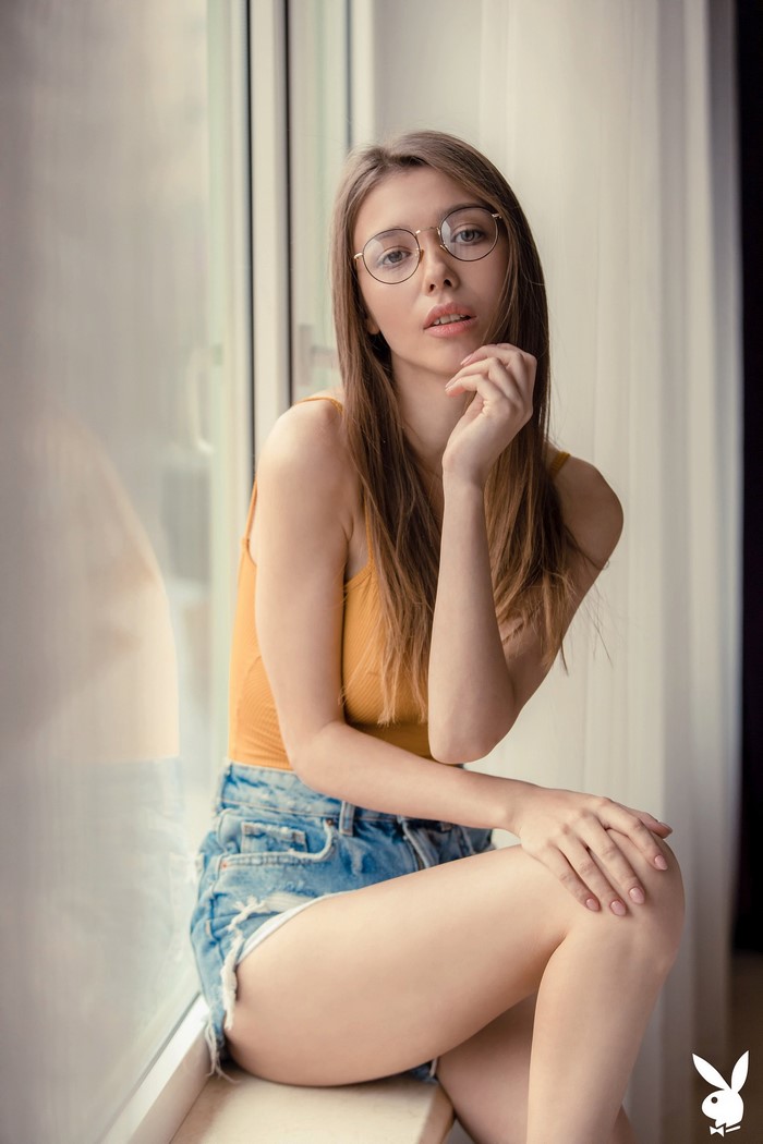 Mila Azul in Shorts and Glasses