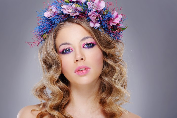 Model with Flower Wreath and Pink Makeup