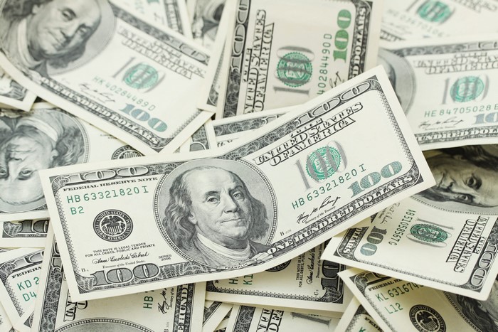 Pile of 100 Dollar Bills