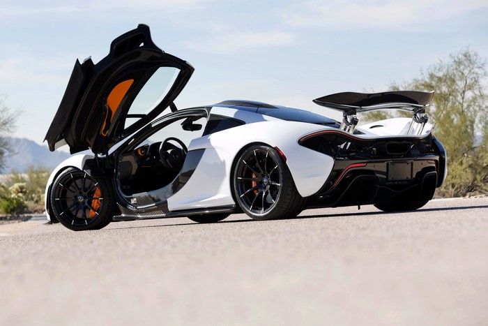 White McLaren P1 Hybrid Coupe with Opened Doors