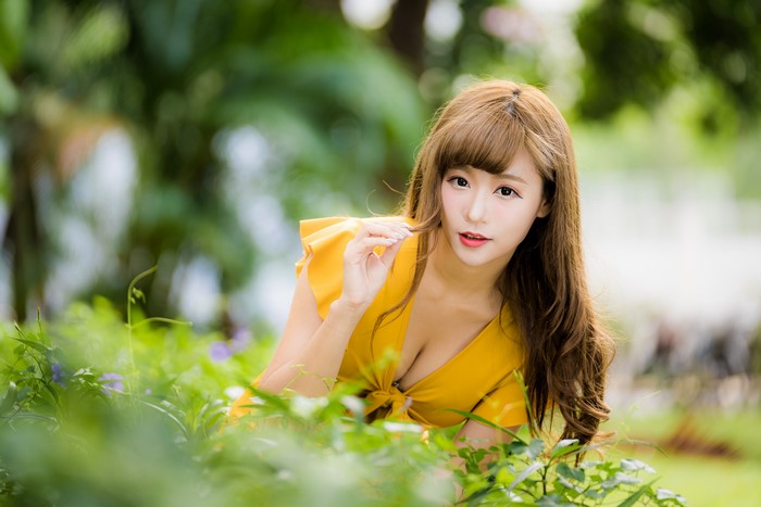 4K Asian Woman in Yellow Dress with Bokeh