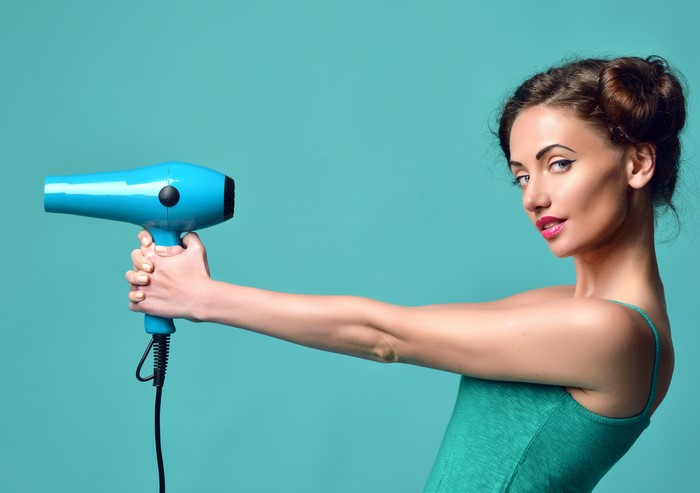 Woman with Hair Dryer