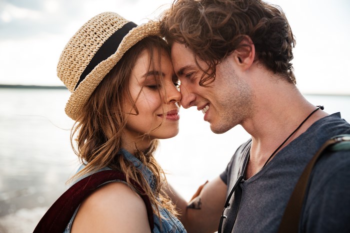 Couple in love wearing a hat