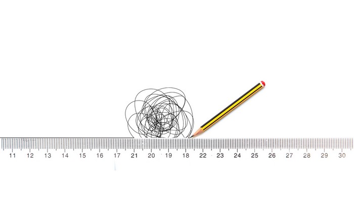 Pencil and ruler with scribbles