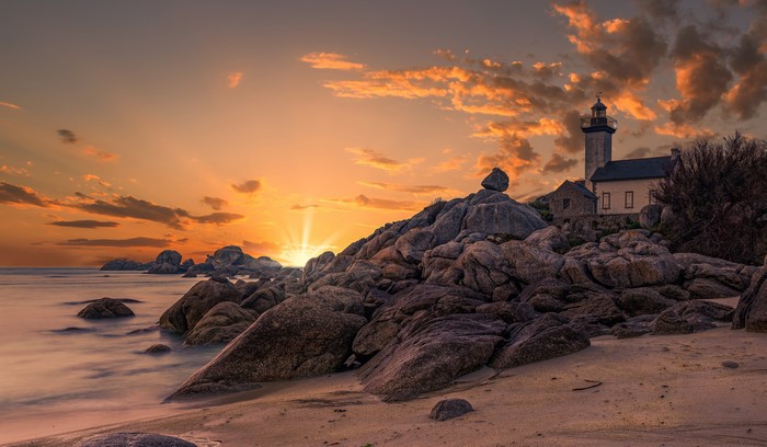 Lighthouse of Pontusval, France at Sunset