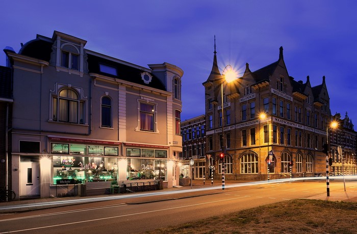 Street view of buildings in Haarlem, Netherlands at night