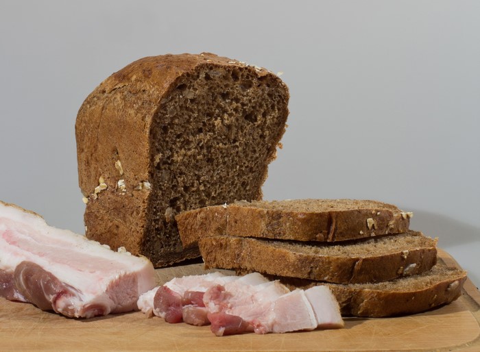 Bread and Salo on a wooden board