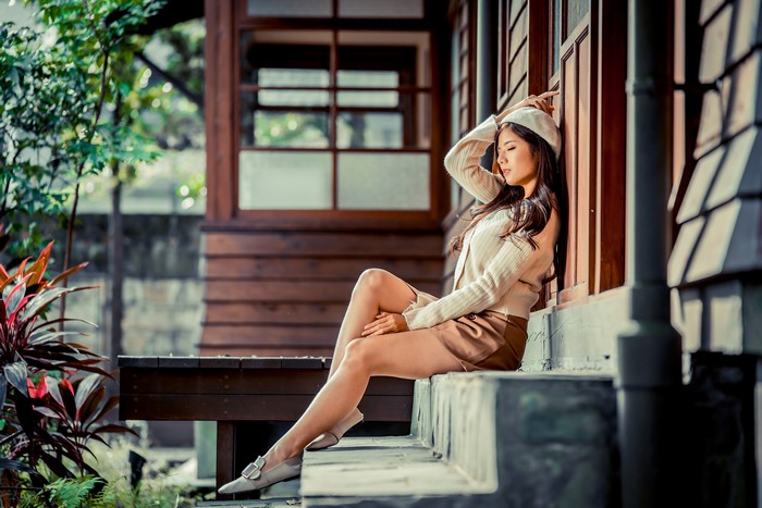 4K Asian Woman Sitting on Stairs in Beret