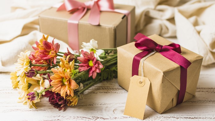 Chrysanthemums and Gifts with Ribbons
