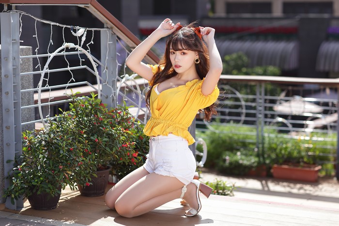 4K Asian Woman in Yellow Blouse and Shorts