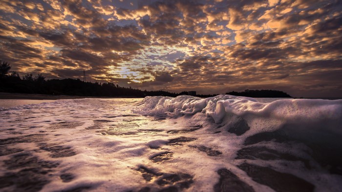 4K Sunset Over Ocean Waves and Clouds