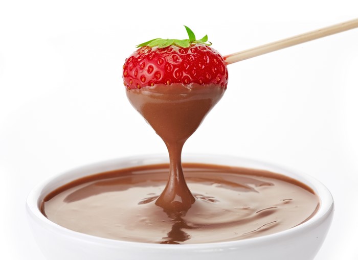 Strawberry dipped in chocolate in a bowl