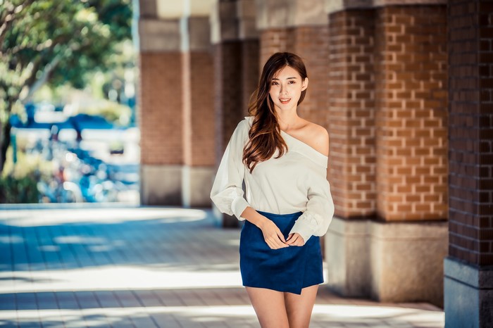 4K Asian Woman in White Blouse and Blue Skirt