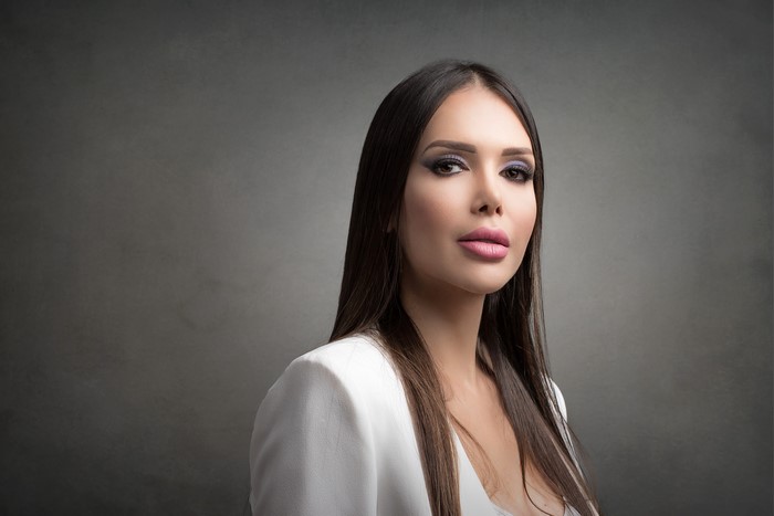 Vivian with makeup on gray background