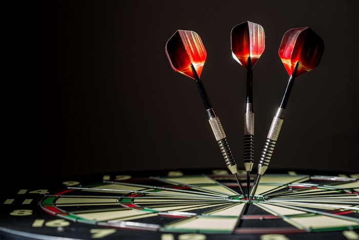 Three darts in a dartboard