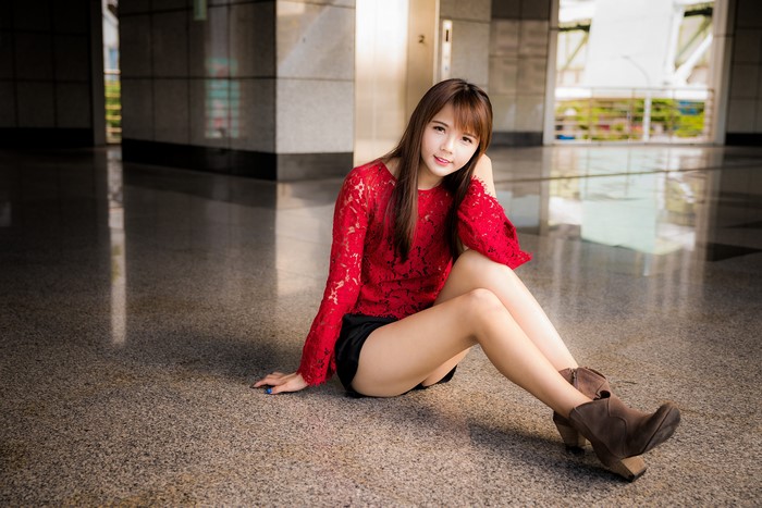 4K Asian Woman Sitting in Red Blouse