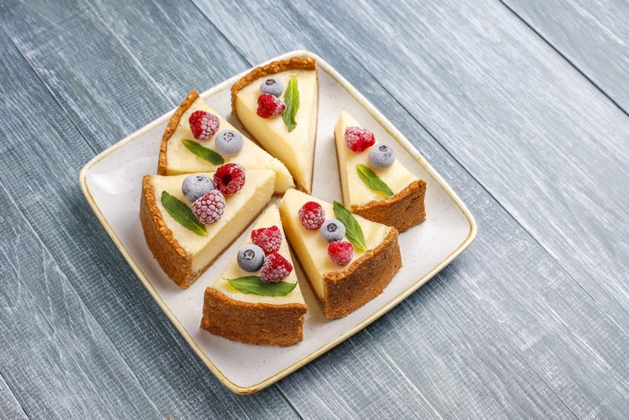 Cheesecake slices with berries on a plate