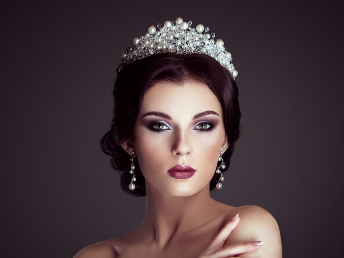 Woman with Crown and Earrings